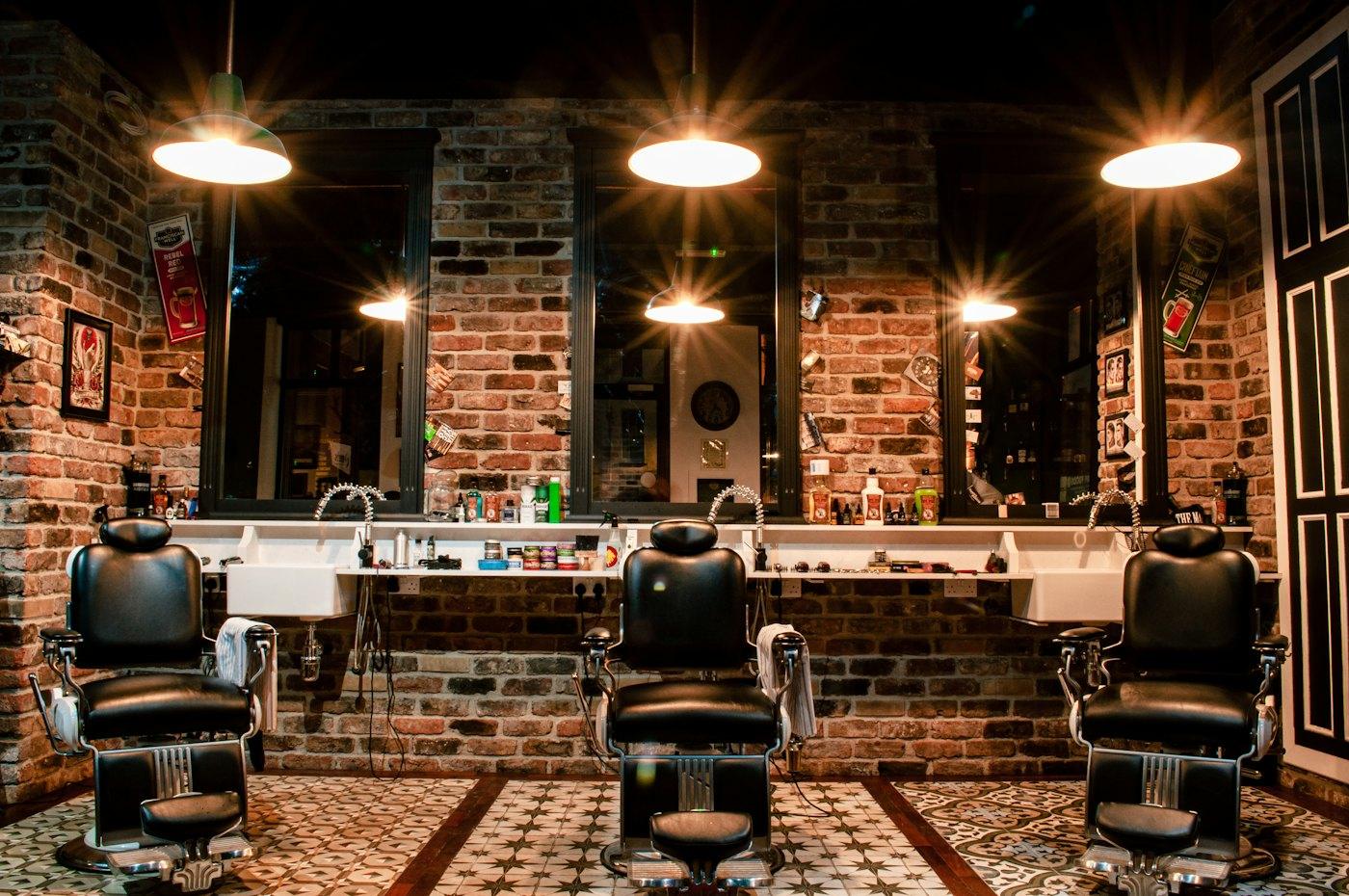 Traditional barbershop interior with leather chairs